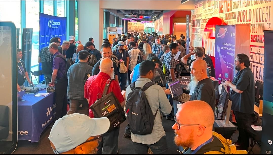 Attendees packing the sponsor hall at Commit Your Code